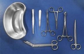 Dental tools and equipment on white background.